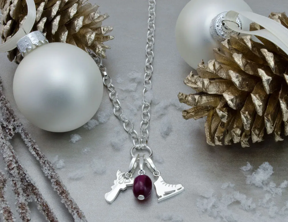 SKATING CHARM IN STERLING SILVER
